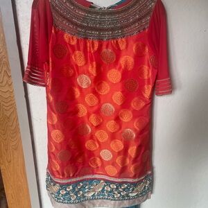Vibrant Orange outfit from India with Gold Accents